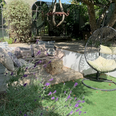 Curl up in the hanging egg chair with a good book out in the garden