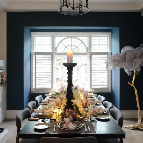 Sit down for a feast with friends and family around the impressive dining table