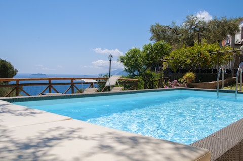 Cool off in the pool as islands shimmer on the horizon