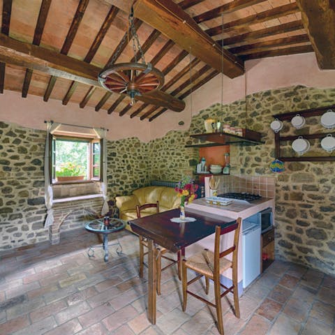 Admire the rustic charm of the old farmhouse kitchen