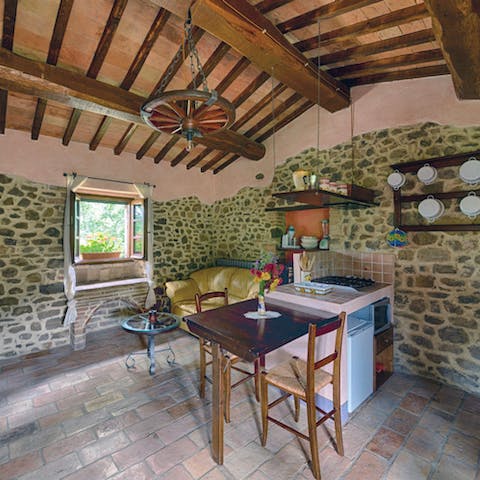 Admire the rustic charm of the old farmhouse kitchen