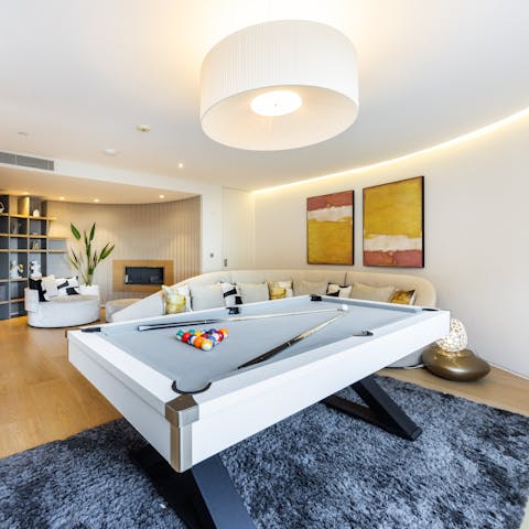 Get together for a pool tournament in the snug