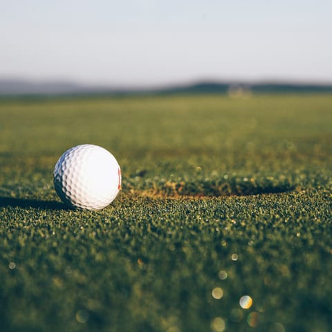 Practice your swing at the nearby golf course