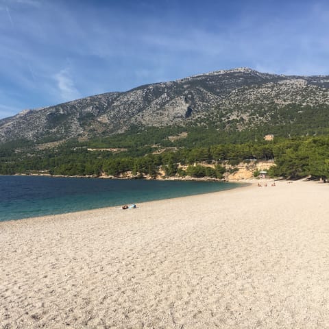 Enjoy a day at the beach, just a thirteen-minute walk from the villa