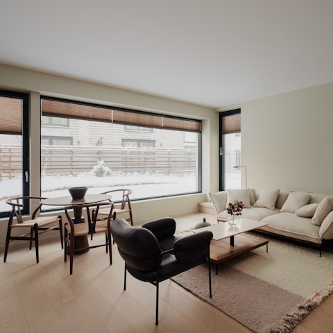 Bask in bursts of Nordic sunshine out on the home's private terrace and garden