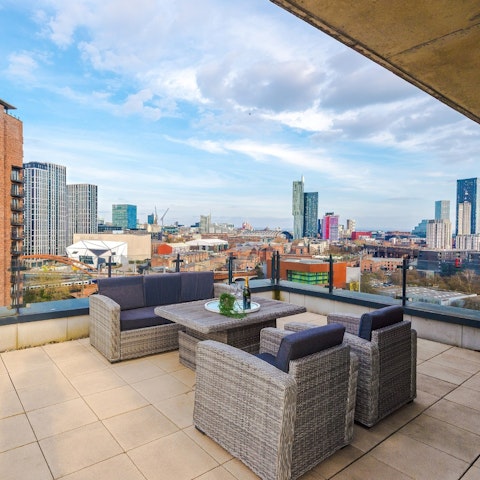 Soak in the riverside views from the enormous private terrace
