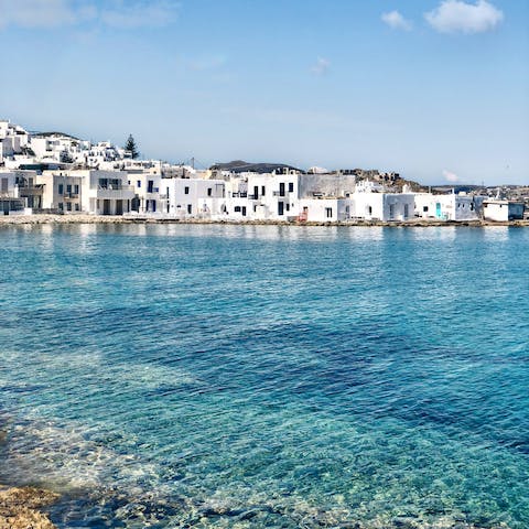 Wander the charming cobbled streets of nearby Naoussa, a ten-minute drive away
