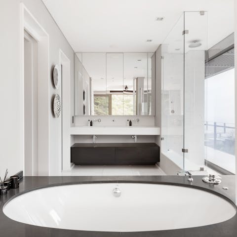 Treat yourself to a long and soothing soak in one of the sleek bathtubs