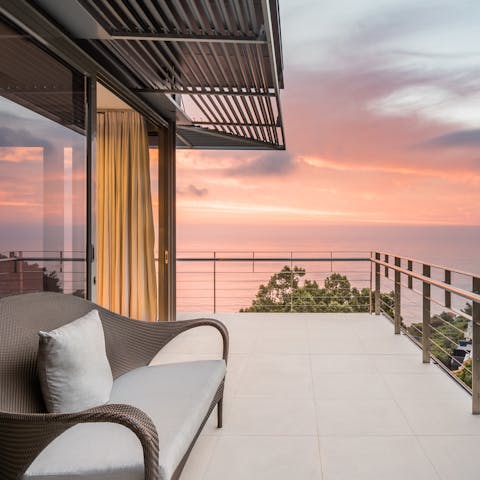 Catch the sun setting over the Atlantic Ocean from one of the balconies