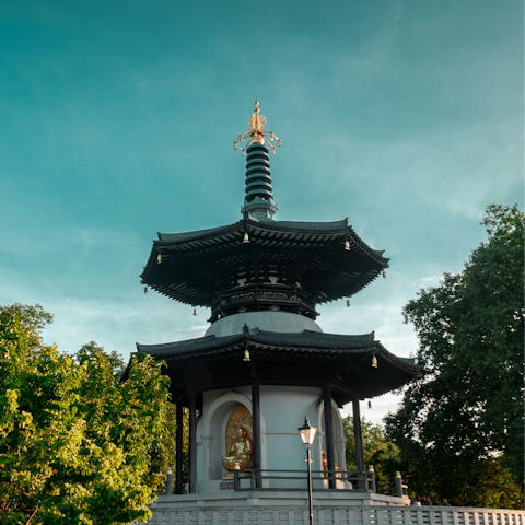 Enjoy a peaceful stroll around Battersea Park, a fifteen-minute walk away