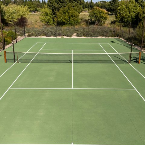 Play tennis in the sunshine on the private court