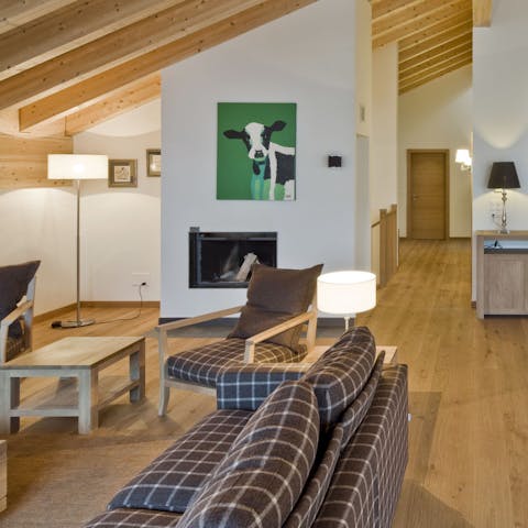 Cosy up by the fire in the living room