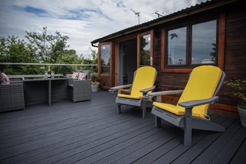 Relax in the sunshine overlooking the large garden