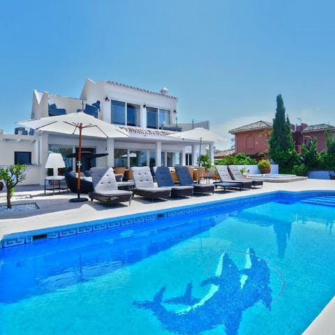 Swim some laps of your outdoor pool to cool off on hot and sunny days