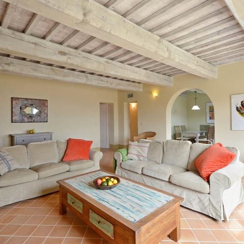 Unwind in the cosy living space with a glass of red wine