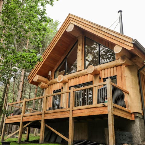 Breathe in the fresh woodland air while relaxing on the terrace