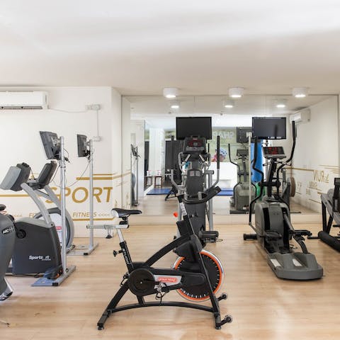 Work up a sweat in the communal fitness centre