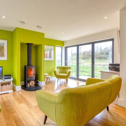 Cosy up in front of the wood burner after a busy day of outdoor activities