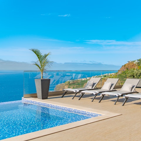 Enjoy scenic sea views as you swim and sunbathe