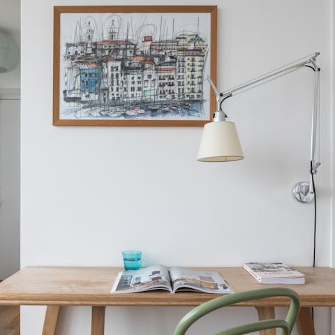 Leaf through the host's magazines or books at the desk on rainy day