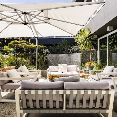 Relax in the shade of the outdoor lounge area