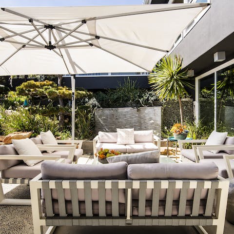 Relax in the shade of the outdoor lounge area