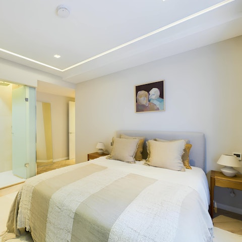 Slip into the sumptuous bed after a day of London sightseeing