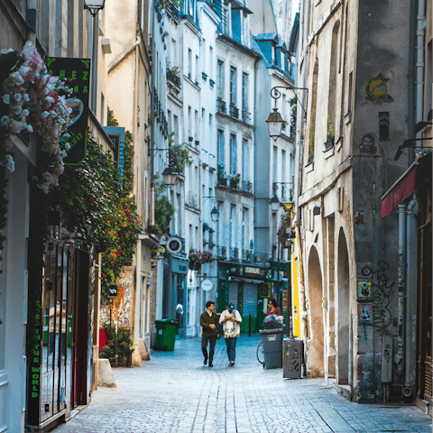 Wander through Paris's charming Le Marais district — just a twenty minute walk from the home