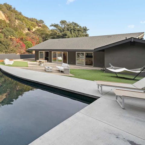 Soak up the Californian sun lounging next to the swimming pool