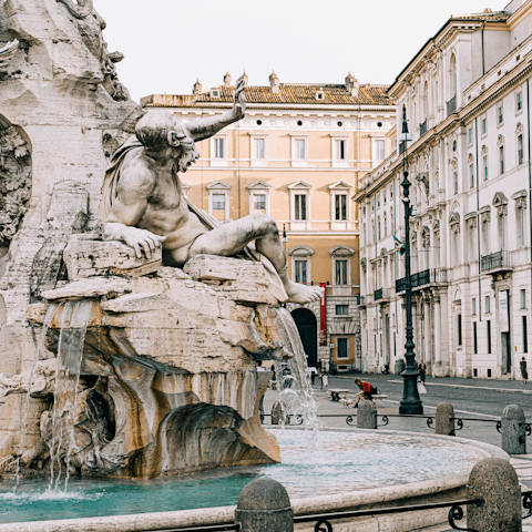 Visit the iconic three fountains at Piazza Navona, a must-see in Rome