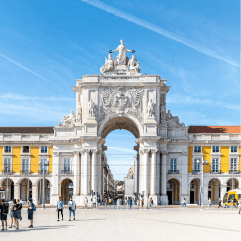 Visit bustling Praça do Comércio, fifteen minutes away on foot
