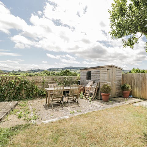 Take in the views of the surrounding countryside from the garden