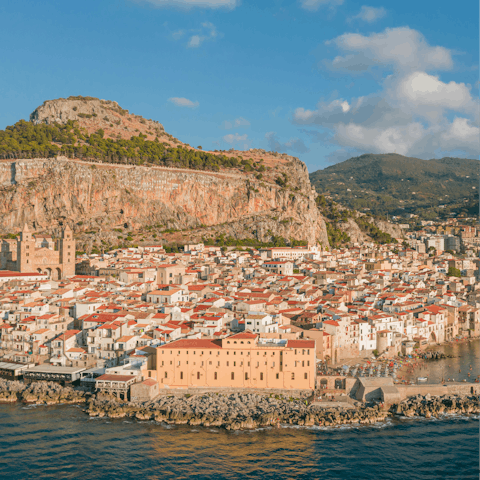 Stay near the historic coastal city of Cefalù