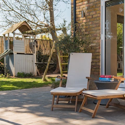 Settle down on the terrace with your holiday read as the children enjoy the climbing frame