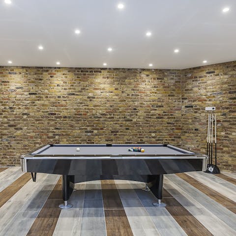 Plan a family games night in the billiards room