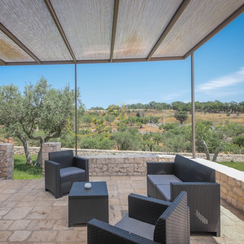 Unwind in your private patio with views of nature