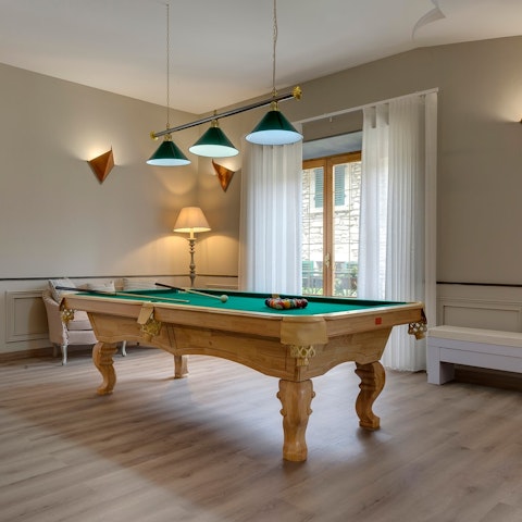 Get competitive playing pool during cocktail hour