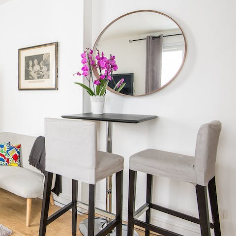 Enjoy coffee and pastries at the charming breakfast table