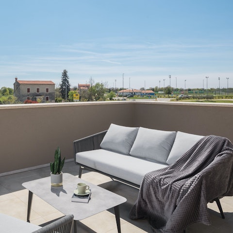 Sip cocktails on the terrace as the day draws to a close