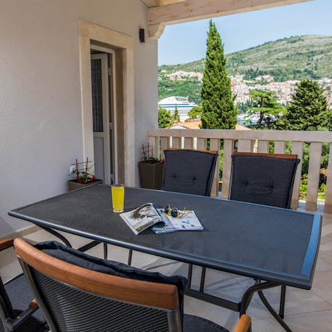 Sip cocktails on the balcony while the sun is setting