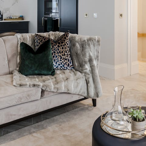 Sprawl out on the sofa with a good book and a glass of wine