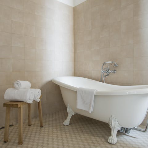 Relax and unwind with a soak in the bathtub