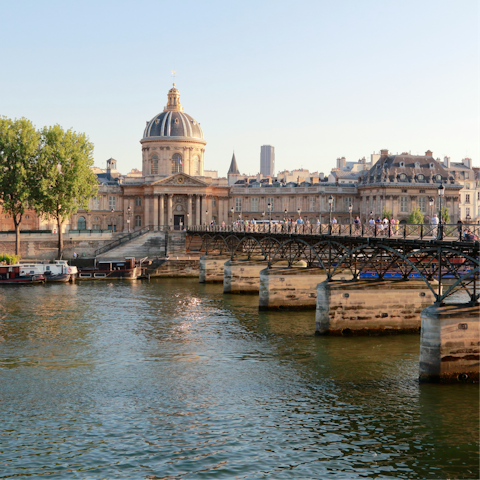 Cross the famous Pont des Arts over the Seine