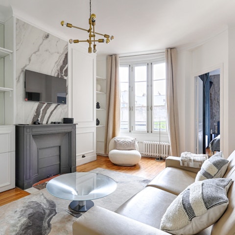 Rest weary feet in the bright living area