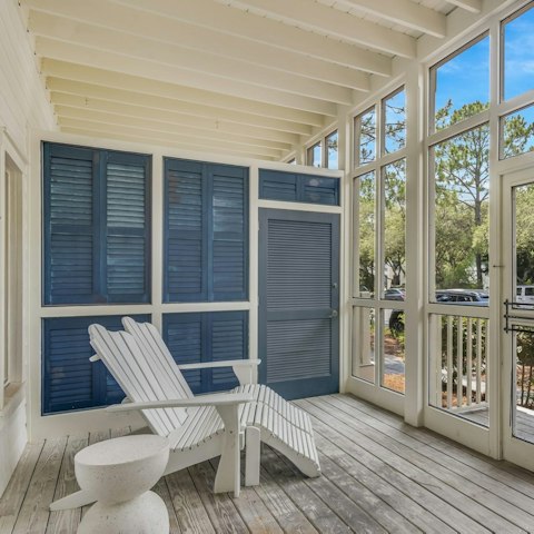 Catch the fresh coastal breeze from the screened porch
