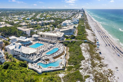 Take a dip in the resort's shared pools overlooking the Gulf coast