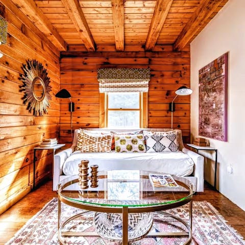 Snuggle up with a book in the timber living area