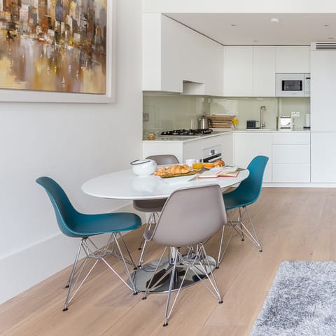 Pull up an Eames chair and enjoy breakfast around the dining table