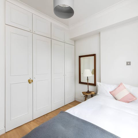 Settle into the bedroom, offering plenty of storage
