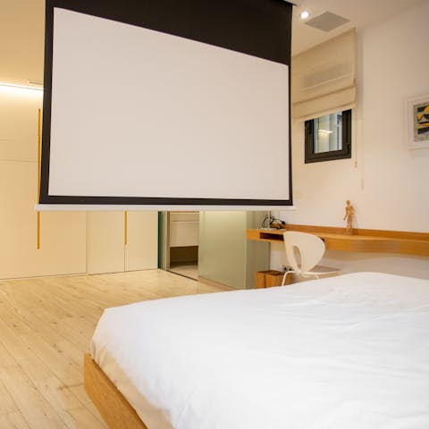 Relax with a movie screened on the home projector